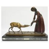 1003	MENRILLE LARGE CONTEMPORARY BRONZE OF WOMAN FEEDING A DOE ON MARBLE BASE, APPROXIMATELY 26 IN X