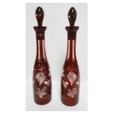 1013	RUBY CUT TO CLEAR DECANTERS, EACH APPROXIMATELY 16 IN H