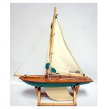 1029	POND BOAT ON STAND, APPROXIMATELY 17 IN X 5 IN X 20 IN H