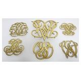 1037	COLONIAL WILLIAMSBURG, VIRGINIA METALCRAFTERS BRASS TRIVETS, LARGEST APPROXIMATELY 9 IN X 10 IN
