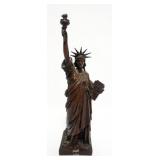 1066	STATUE OF LIBERTY FIGURE MADE FROM A PIECE OF THE STATUE OF LIBERTY, APPROXIMATELY 12 IN H