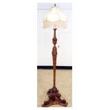 1152	OUTSTANDING CARVED MAHOGANY FLOOR LAMP WITH CARVED LEAF AND MEDALLION CENTER COLUMN AND 3 SCROL