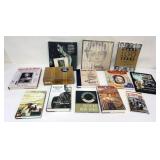 1200	GROUP OF WOODY GUTHRIE BOOKS AND CDS, 1 CD MISSING FROM SET