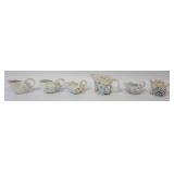 1139	ROYAL BAYREUTH LUSTRE CONCH SHELL CREAMERS, LARGEST APPROXIMATELY 4 1/2 IN HIGH