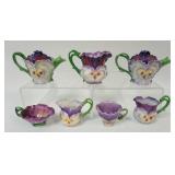 1203	ROYAL BAYREUTH PURPLE PANSY ASSORTED TEAPOTS, CREAMER ETC. LARGEST PIECE APPROXIMATELY 5 IN