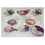 1205	ROYAL BAYREUTH PURPLE PANSY ASSORTED NAPPIES, CANDLESTICK, TEA STRAINER, ETC., LARGEST PIECE AP