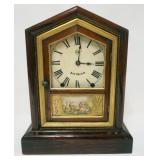 1218	SETH THOMAS COTTAGE CLOCK, APPROXIMATELY 12 IN X 5 IN X 16 IN