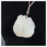 CARVED JADE PENDANT & STERLING NECKLACE | Carved jade pendant on sterling silver necklace. Carvings 