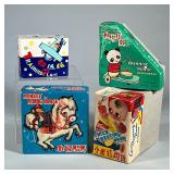 (4pc) Vintage Toys From China | Including a Drumming Panda, Training Plane, Child Beating Drum and M