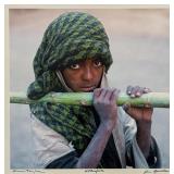 Jim Spillane (American, 1950s-) Photograph - "Ethiopia" | Portrait of a young woman wearing a green 