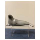 Inuit Figurine (Canadian) - Seal Laying Down | Stone carving of a seal laying down with its flipper 