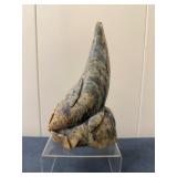 Inuit Figurine - Sea Lion | Stone carving of a sea lion perched upright on a rock, leaning toward th