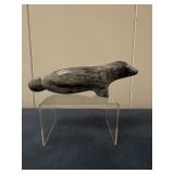 Inuit Figurine - Seal on Front Legs | Stone carving of a seal, either swimming with back fins traili