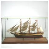 Model Ship “Susie-Q” In Glass Case | Clipper ship is painted dark red, black and off white. Has deli