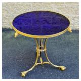 Gilt Brass Accent Table With Eagle, Serpent, and Claw Motifs | Blue plexiglass top, gilt brass rim w