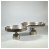 (2pc) PAIR AERO NYC PEDESTAL TRAYS | Pair of cast aluminum pedestal trays, marked on bottom Aero NYC