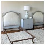 PAIR FRENCH STYLE TWIN HEADBOARDS | Upholstered with damask fabric. Decorative finials and rope mold