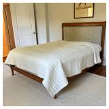 ANTIQUE TULIPWOOD BED FRAME | Tulipwood bed frame features scroll details and striped upholstered he