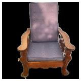OAK MORRIS CHAIR | Art Nouveau Woman’s Face Decorated Morris Chair with cushions and adjustable rod.