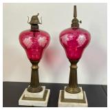 CRANBERRY OIL LAMPS | 19th C Pair of Oil Lamps with cranberry cut to clear grape vine design, brass 