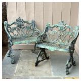 PAIR FANCY CHARLESTON STYLE CAST IRON GARDEN CHAIRS | A pair of ornate cast iron garden benches with