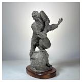 "Petro Enko" Studio Pottery Figure | A signed pottery figure depicting a man with bowls and a jar, s