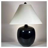 Mid-Century Black Ceramic Table Lamp | With a painted wood finial Dimensions: h. 26.5 x dia. 10 in (