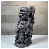 African Carved Hardwood Figural Group | Dark carved wood with many figures, highly textured, having 