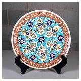 Signed Painted Pottery Plate | Colorful flower decoration with impressed stamp mark to underside Dim