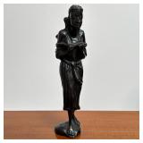 African Carved Wood Figure | Carrying a basket or jar Dimensions: h. 12 x l. 4.25 in