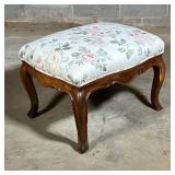 ANTIQUE QUEEN ANN WALNUT FOOTSTOOL | With floral patterned cushioned upholstery, over cabriole legs 