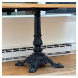 Cast Iron Table Base | With a later wood top attached; overall size of table h. 28.75 x 55 in. Dimen