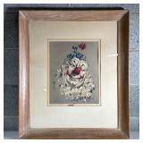 (2pc) Framed And Signed Clown Prints | One happy and one sad clown in light wooded frames. Dimension