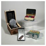 (6pc) Vintage Zippo Lighters, Colibri Cigar Lighter, And Collector’s Scotch Glass