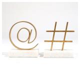 (2pc) GLOBAL VIEWS BRASS-FINISHED METAL AND MARBLE SYMBOL SCULPTURES | A pair of contemporary sculpt