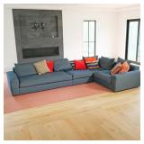 POLIFORM MODULAR SECTIONAL SOFA | A three-piece modular sectional upholstered in blue textured fabri