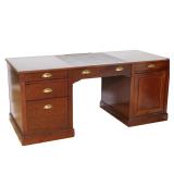 FRENCH MADE TRADITIONAL MAHOGANY FINISH EXECUTIVE DESK | The desk is constructed from wood with a ma