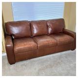AMERICAN LEATHER COMFORT SLEEPER SOFA | Three-seat sofa upholstered in distressed brown leather feat