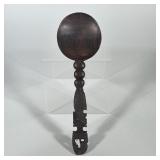ZULU STYLE WOOD SERVING SPOON | A dark-stained wooden serving spoon featuring a circular bowl and a 