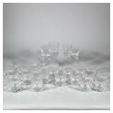 (23pc) BACCARAT HARMONIE CRYSTAL TUMBLERS | A collection of twenty-three clear crystal tumblers in a