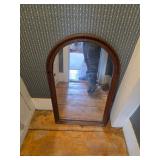 Wooden framed arched mirror