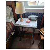 Side table, lamp, apple coasters, doily