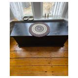 Wooden chest, woven trivet