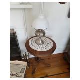 Oil lamp style, Round wooden table, Old News papers
