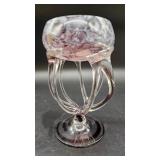 A pink and white mottled art glass compote or rose bowl with applied openwork stand and red internal