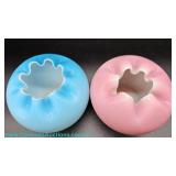A pair of cased satin glass rose bowls in blue and pink with polished pontils and ruffled rims, each