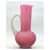 Victorian-era satin quilted cranberry pitcher with applied reeded handle, circa late 19th century, m