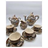 Japanese Satsuma Dragon ware tea set featuring raised moriage detailing and figural dragon spouts, d
