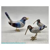 Three Chinese cloisonné enamel bird figurines with brass legs and feet, including one larger songbir