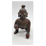 Antique Indian bronze crawling Krishna (Bala Krishna) figure with inlaid eyes and remnants of red an